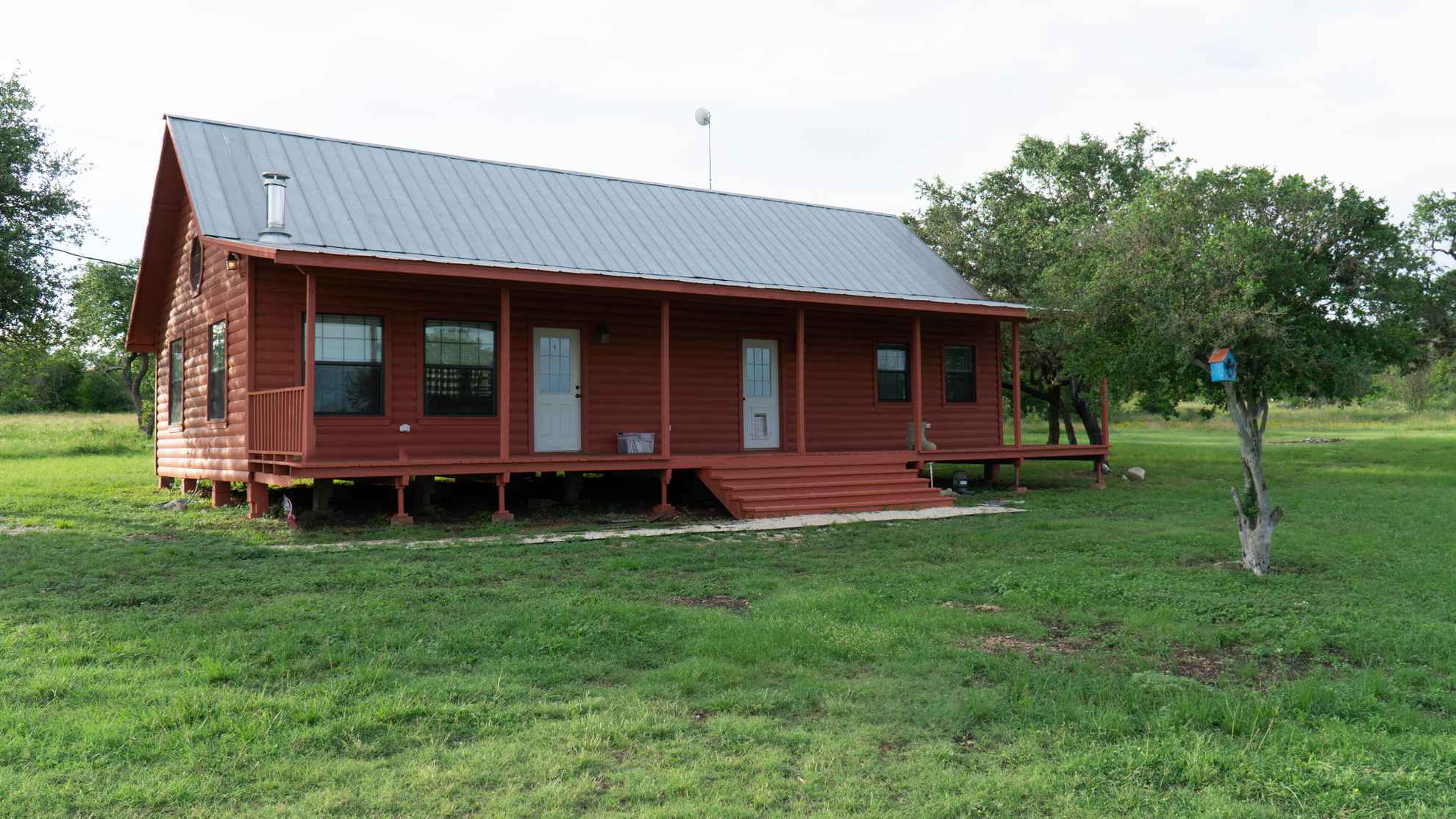 Utopia Log House Texas Land and Ranch Co Morris Killough Utopia, TX